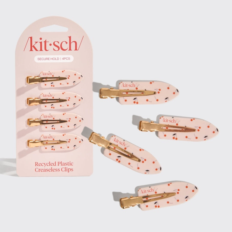 Four cherry-print recycled plastic creaseless hair clips with a playful pattern.