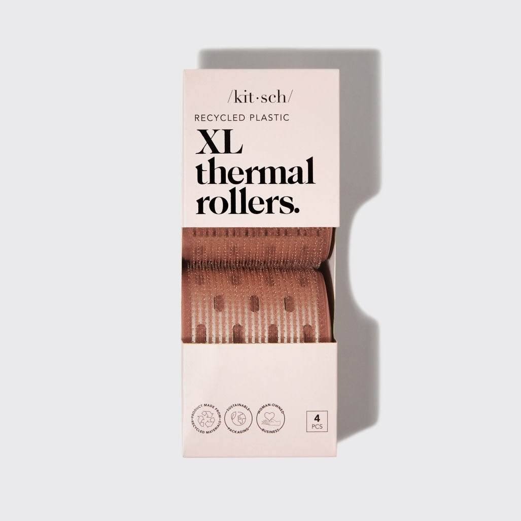 Four-piece set of terracotta recycled plastic XL thermal rollers with ceramic-coated cores.