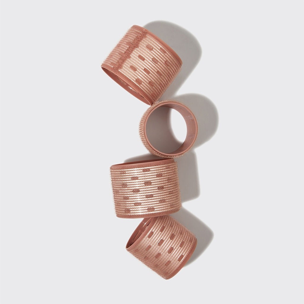 Four terracotta recycled plastic XL thermal rollers with ceramic coating in a set.