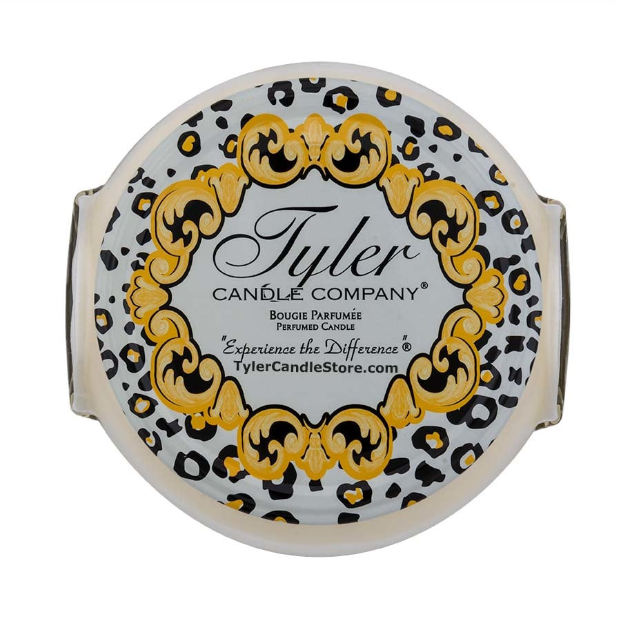 Tyler Candle Company 11oz Regal 2 wick candle with a gold baroque frame and leopard print pattern.