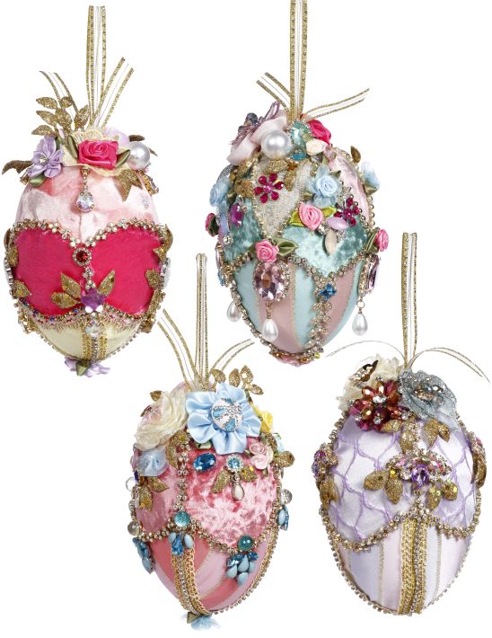 Six-inch foam Easter egg decorated with fabric flowers and jewels on a ribbon hanger.