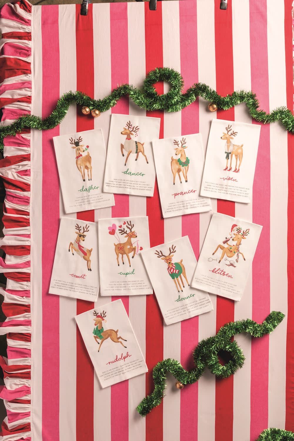 Cotton hand towel featuring a reindeer poem with glitter accents in red and white.
