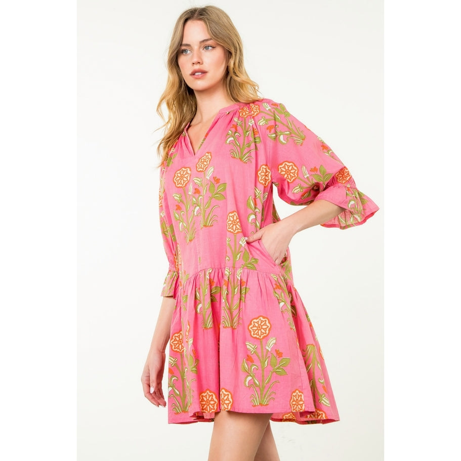 Hazel woven cotton short sleeve dress with floral print in a relaxed A-line silhouette.