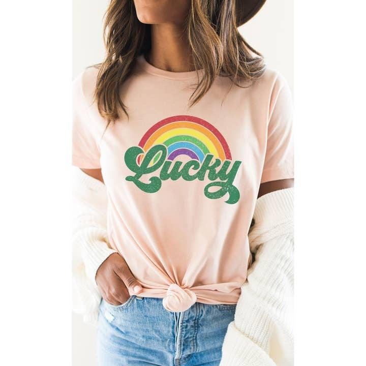 Vintage rainbow distressed graphic tee with lucky St Patricks Day text on a cotton/poly blend shirt.