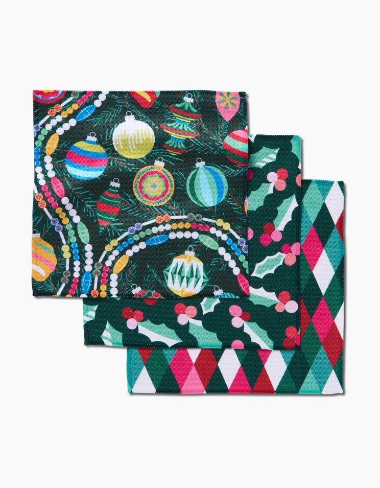 Set of three retro holly waffle weave dishcloths with hang loops made from recycled polyester.