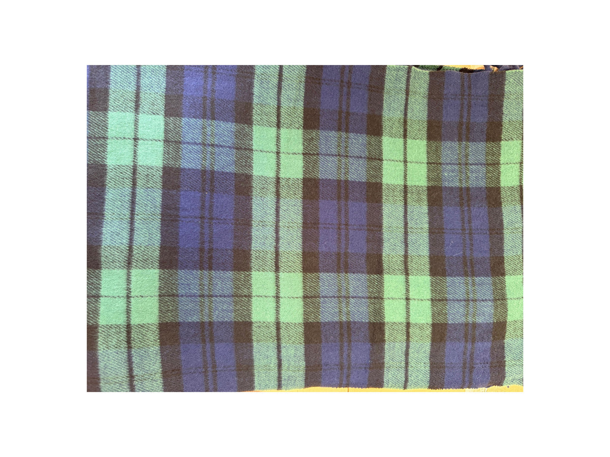 Scottish plaid cashmere scarf in a green, navy blue, and black tartan pattern.