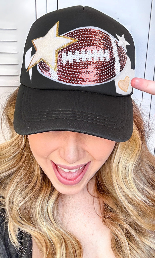 Black trucker hat with embroidered football patch on front panel