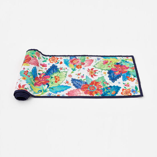 Tobacco Leaf Table Runner featuring a tobacco leaf print on fabric with scalloped edges.