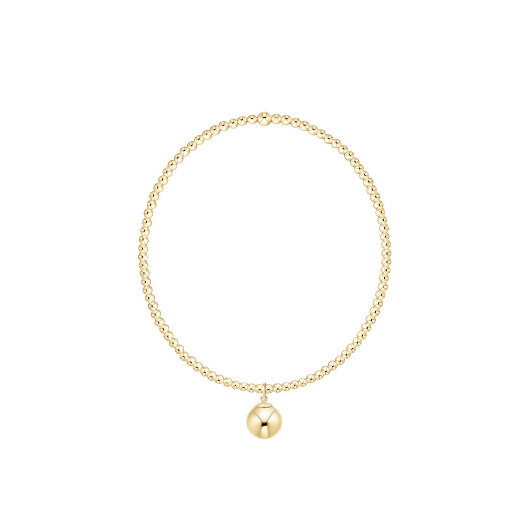 Classic gold 2mm beaded stretch bracelet with a single 8mm gold ball charm.