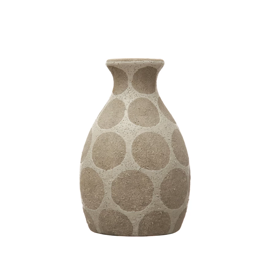 Terra-cotta ceramic vase featuring wax relief dot texture on a cylindrical silhouette.