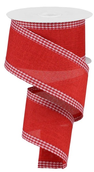 Red farmhouse ribbon with a white gingham check border on a spool.