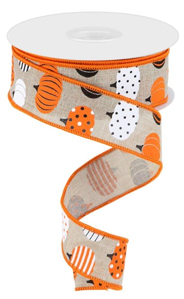 Red polyester ribbon with orange pumpkin patterns on a white background.