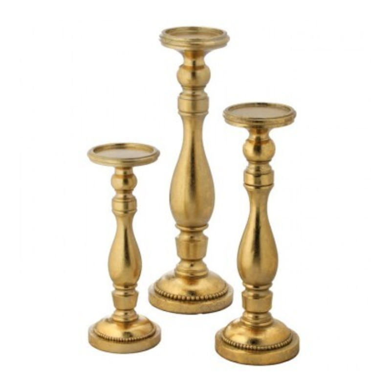 Three gold resin candle holders in varying heights with elegant curved stems and beaded bases.