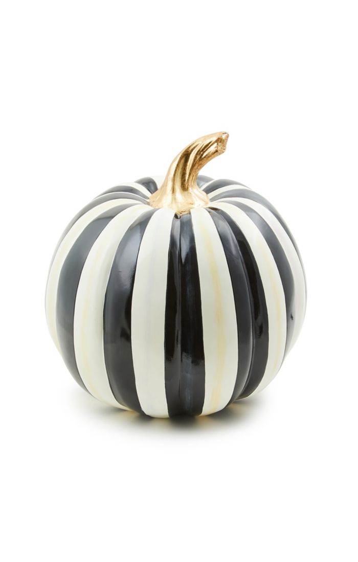 Medium glossy pumpkin with vertical black and white stripes and a gold stem.