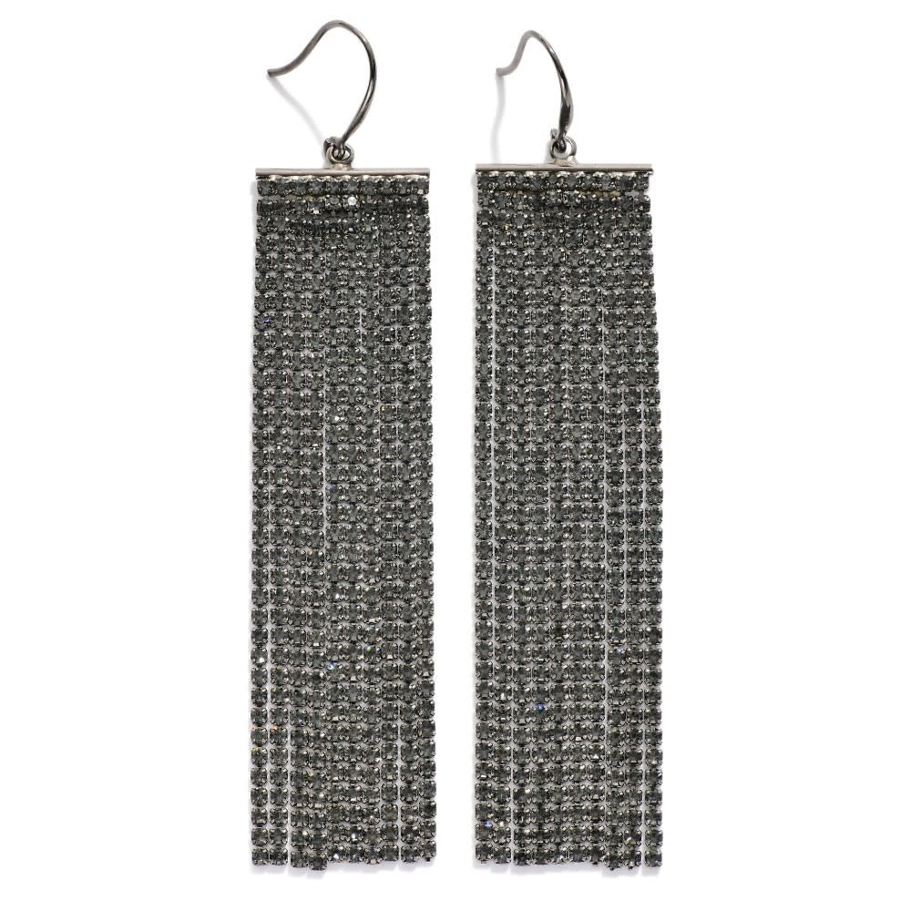 Silver drop earrings with cascading clear rhinestones on a fringe silhouette.