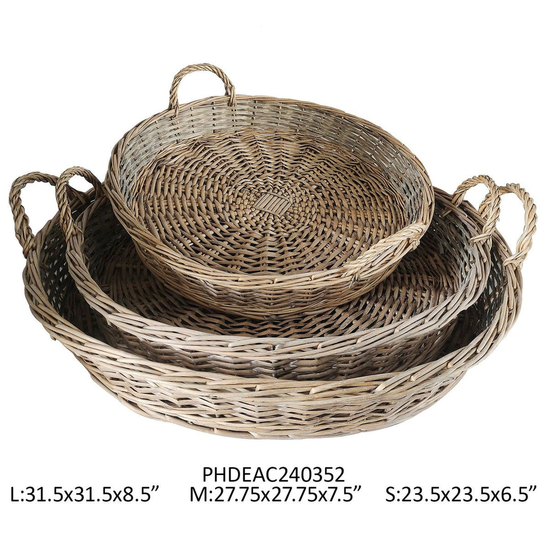 Set of three round woven wicker baskets with handles, in graduating sizes.