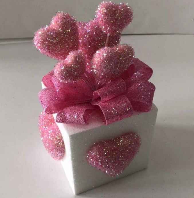 Square glitter gift box with heart patterns in pink foam