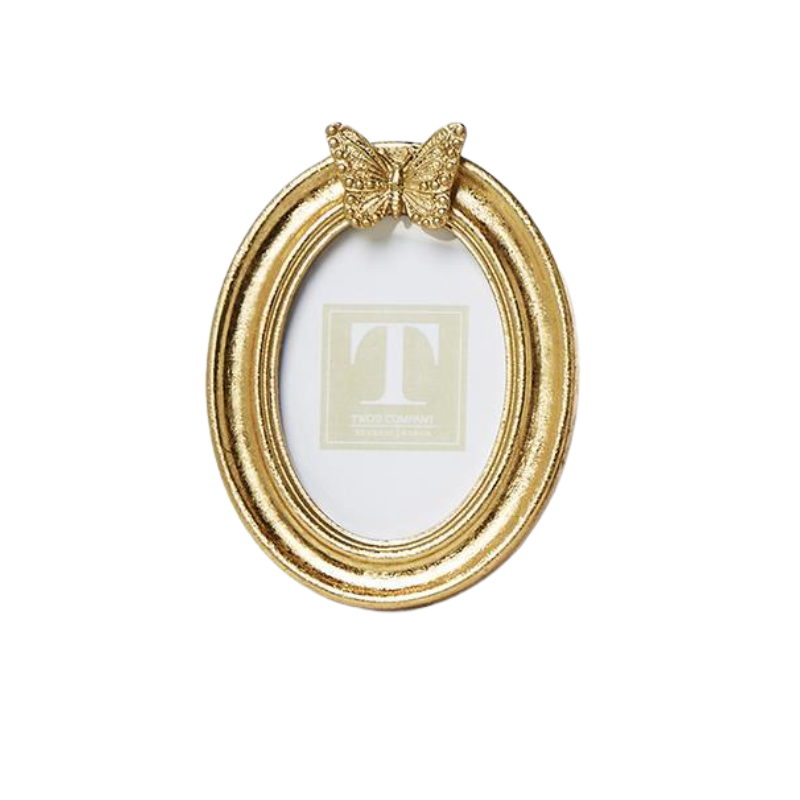 Oval gold leaf finish photo frame with a decorative butterfly accent at the top.