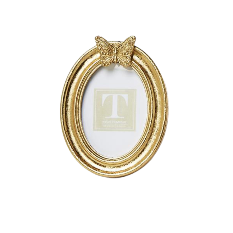 Oval gold leaf finish photo frame with a decorative butterfly accent at the top.