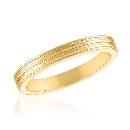 Gold ribbed band ring with layered texture designed for stacking.