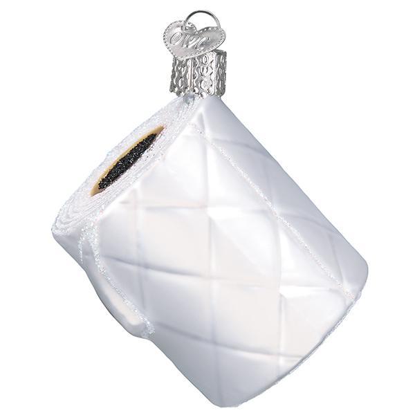 White glass toilet paper roll Christmas ornament with quilted texture and silver glitter accents.