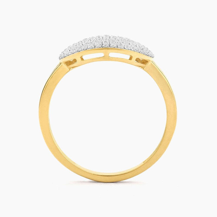 Gold statement ring with a round diamond center stone set in an open halo band.