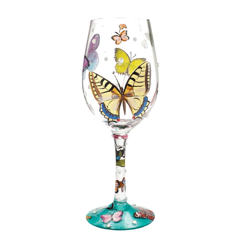 Blown glass wine glass with hand-painted colorful cocktail recipe base and glitter accents.