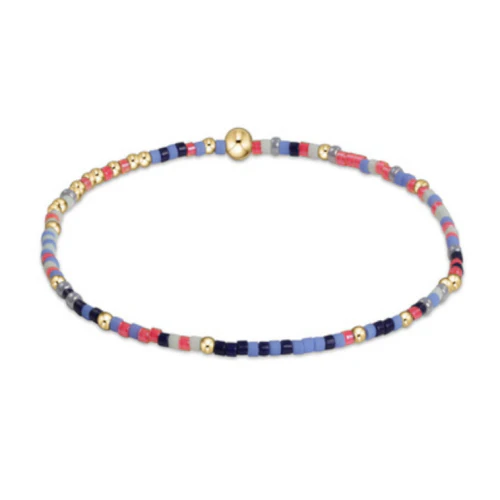 Egirl Hope Unwritten bracelet featuring gold-filled beads with multicolored seed bead accents on stretch elastic.