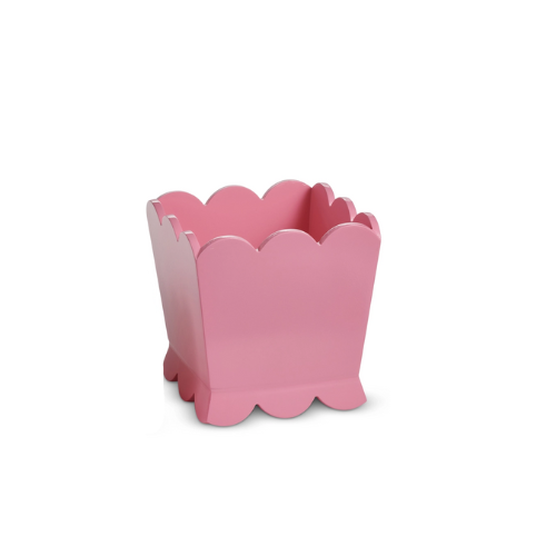 Pink square scalloped planter with a wavy top edge and base, made of MDF.
