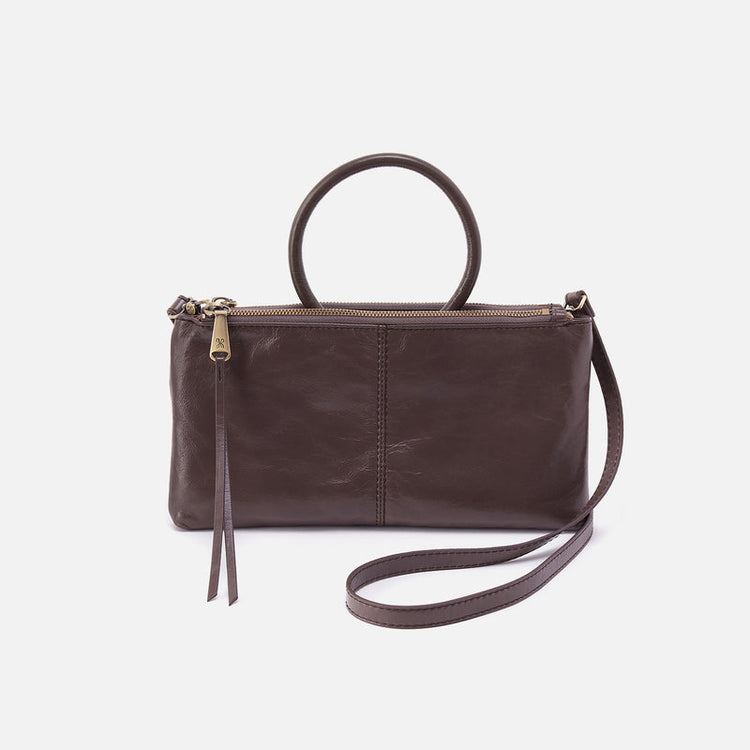 Sable Crossbody in Hearthstone brown leather with a circular top handle and adjustable strap.