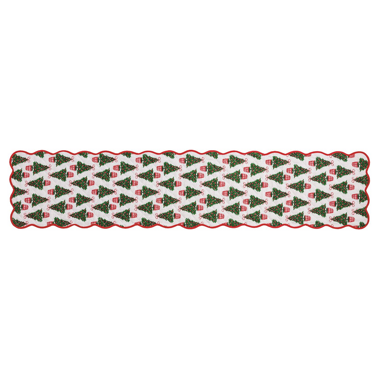 Quilted white table runner with a pattern of green Christmas trees and a red scalloped border.