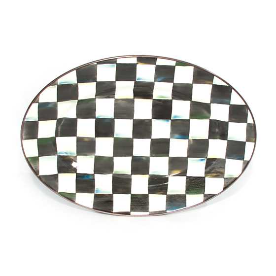 Small oval enamel platter with hand-painted black and white Courtly Check pattern and bronzed rim.