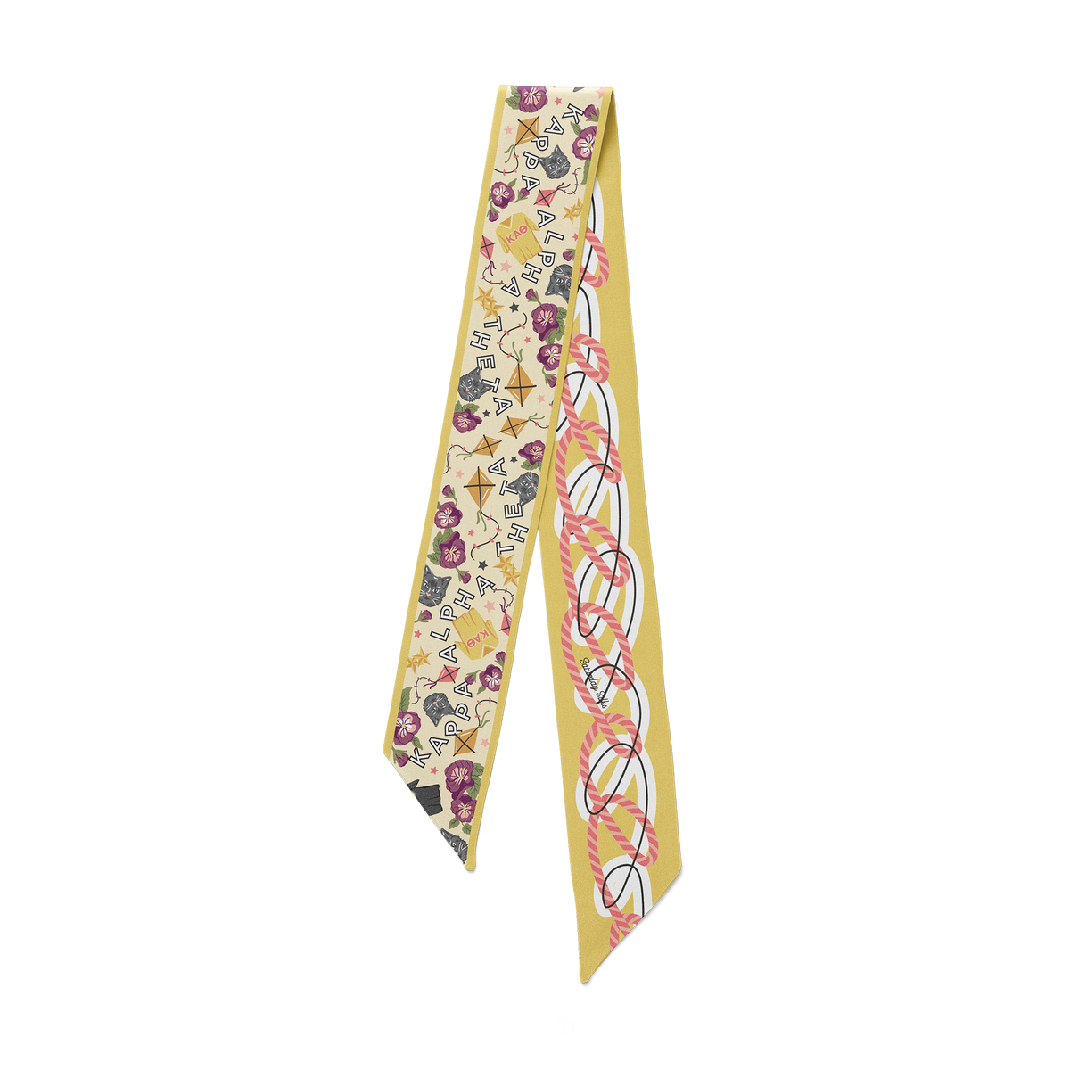 Yellow silk skinny scarf with floral, cat, and kite patterns and Kappa Alpha Theta text.