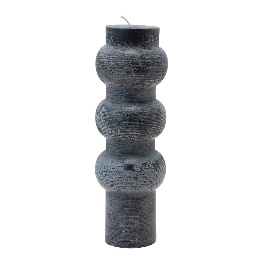 Black unscented totem pillar candle made from paraffin wax with a round silhouette.