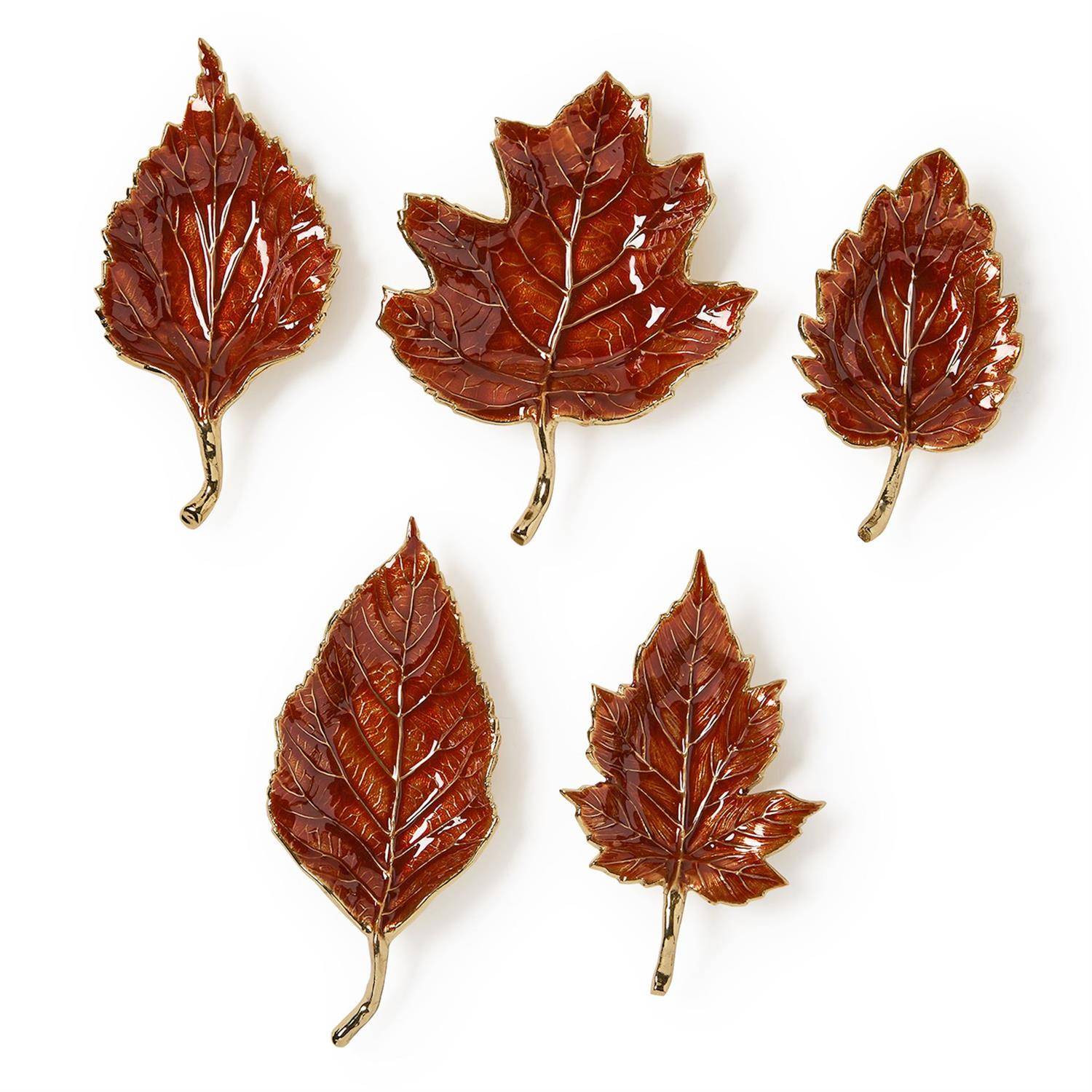 Set of five Autumn Allure enameled leaf trays in various shapes with glossy brown finish.