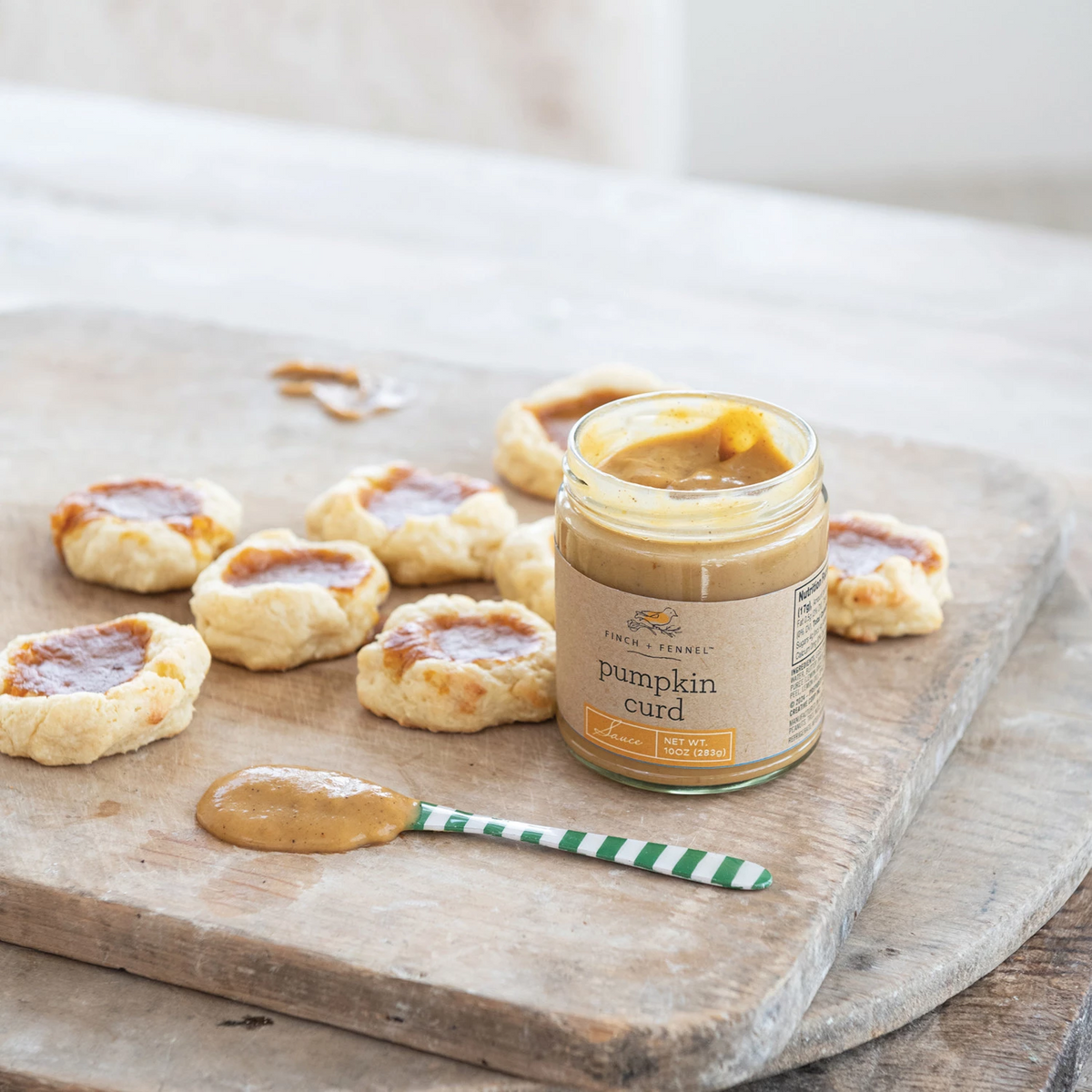 Bottle of Pumpkin Curd Sauce with cinnamon, nutmeg, ginger, citrus hints
