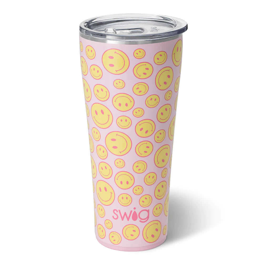 Pink 32oz stainless steel tumbler with a yellow smiley face pattern and a clear lid.