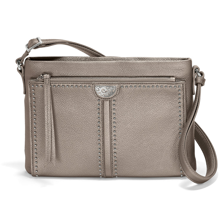 Zinc Pearl leather crossbody organizer with nailhead studs, zippered compartments, and exterior pockets.