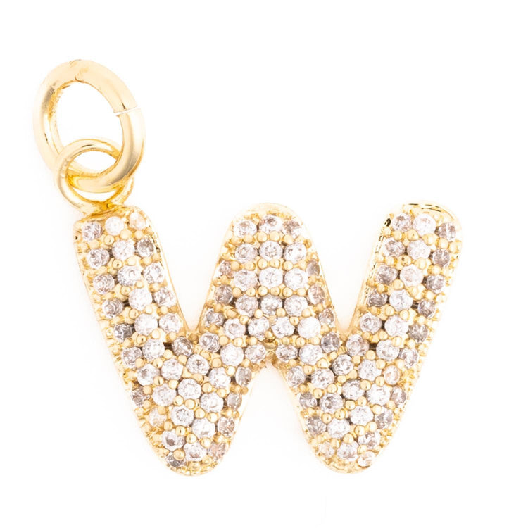Gold letter W charm pendant encrusted with small white crystals.