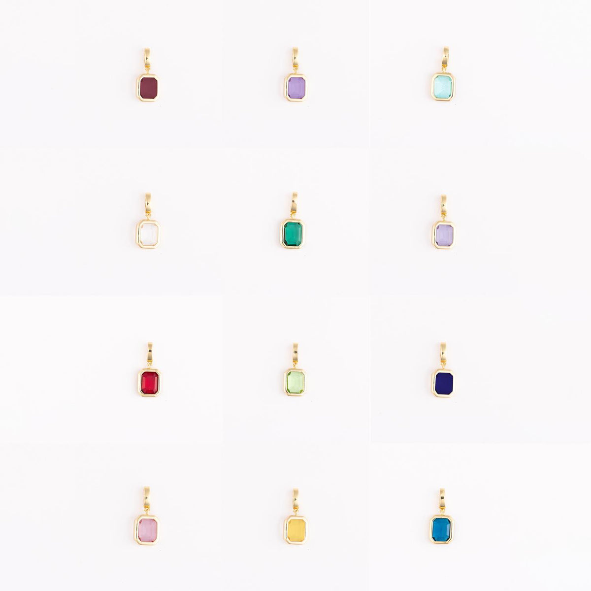 Gold-plated charm featuring a round blue cubic zirconia birthstone with an attached clasp.