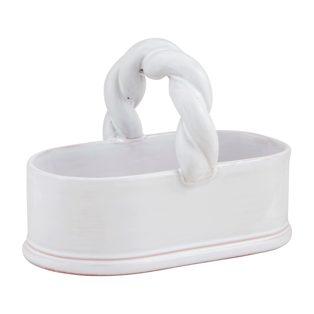 White terracotta tidbit dish with an oval base and a thick twisted handle.