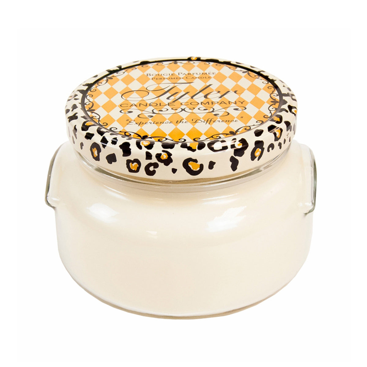 A large glass jar candle with a white wax surface inside.