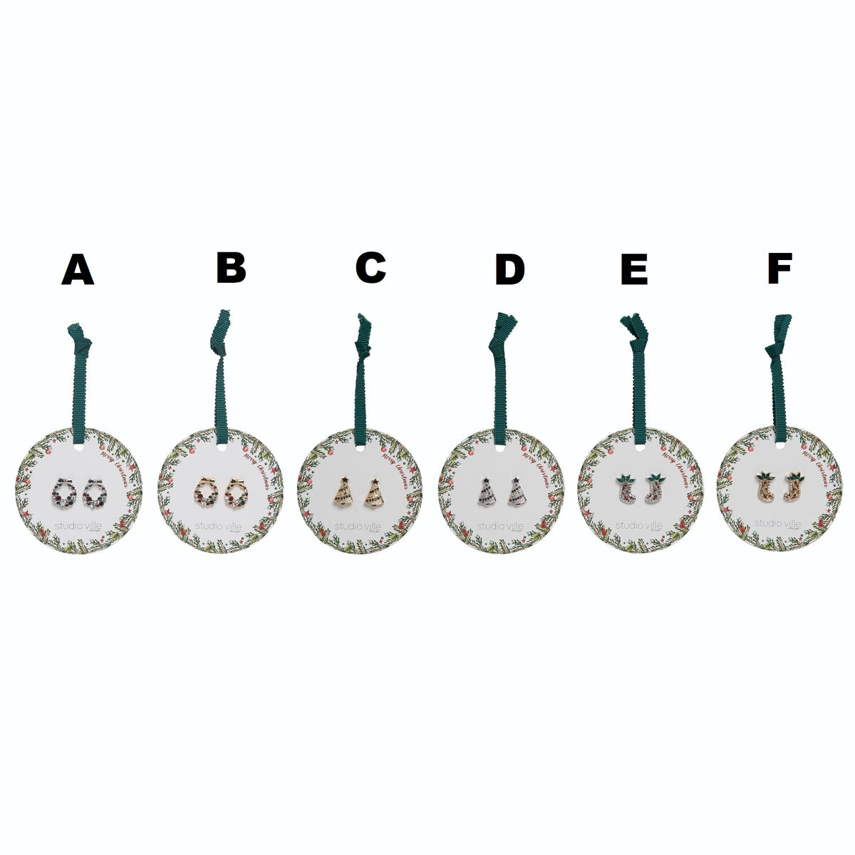 Six pairs of festive Christmas earrings on round cards: bows, trees, and stockings in gold, silver, and red.