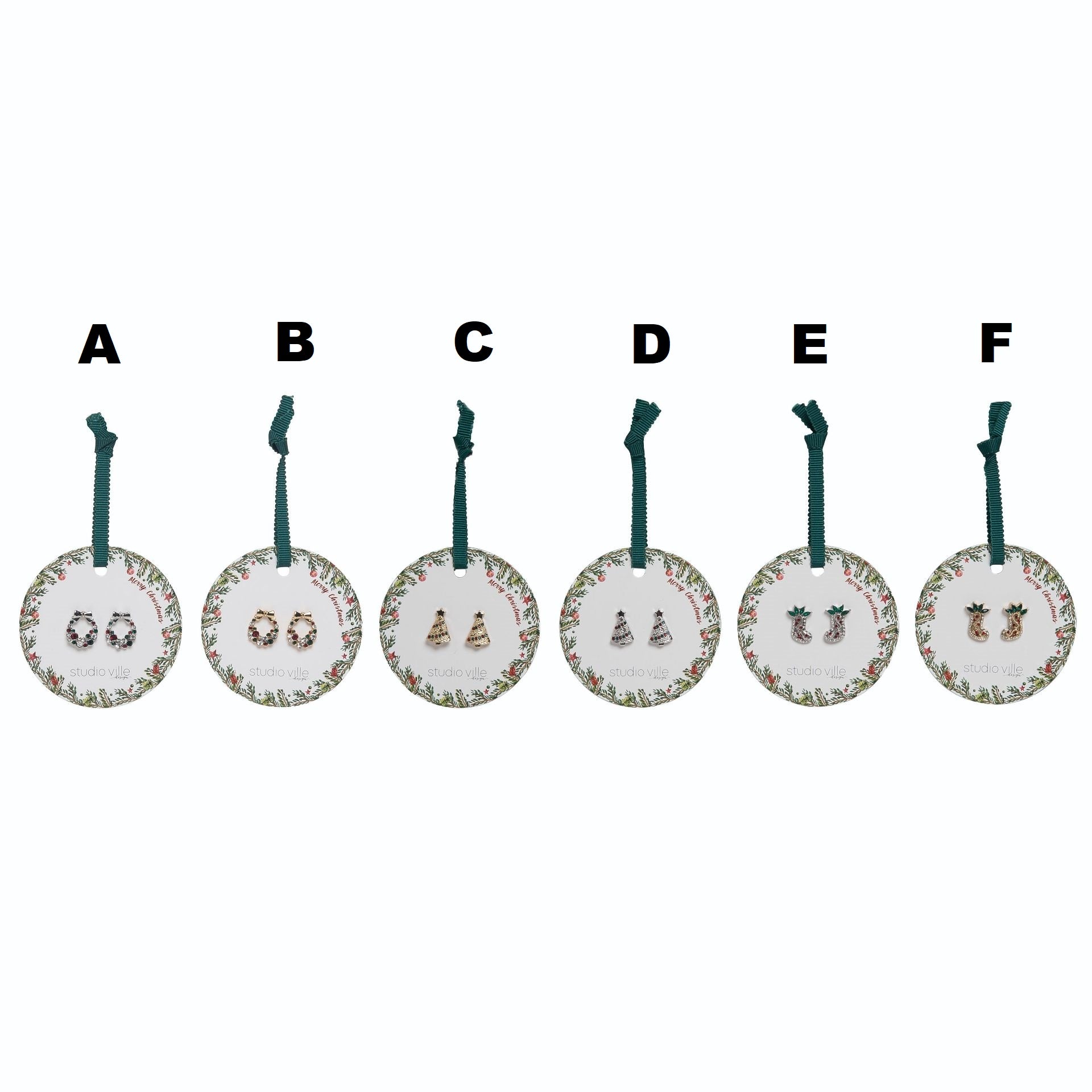 Six pairs of festive Christmas earrings on round cards: bows, trees, and stockings in gold, silver, and red.