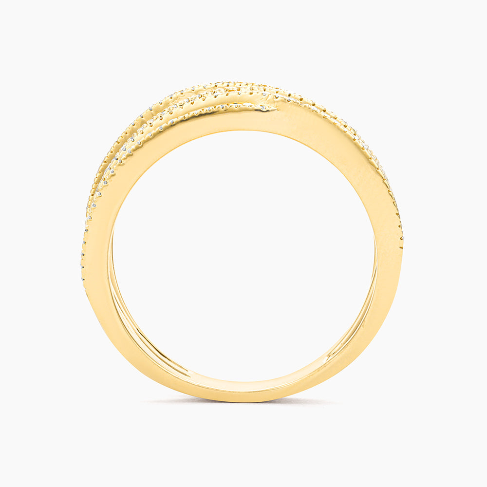 Sterling silver statement ring with gold-plated finish featuring a diamond accent.