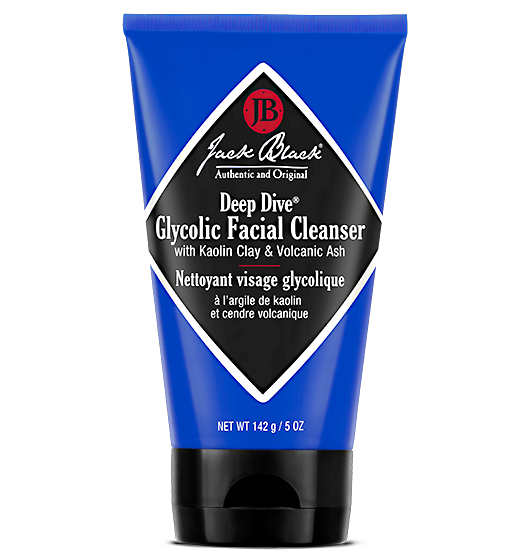 Deep Dive Glycolic Facial Cleanser in a white pump bottle with black text and volcanic ash particles.