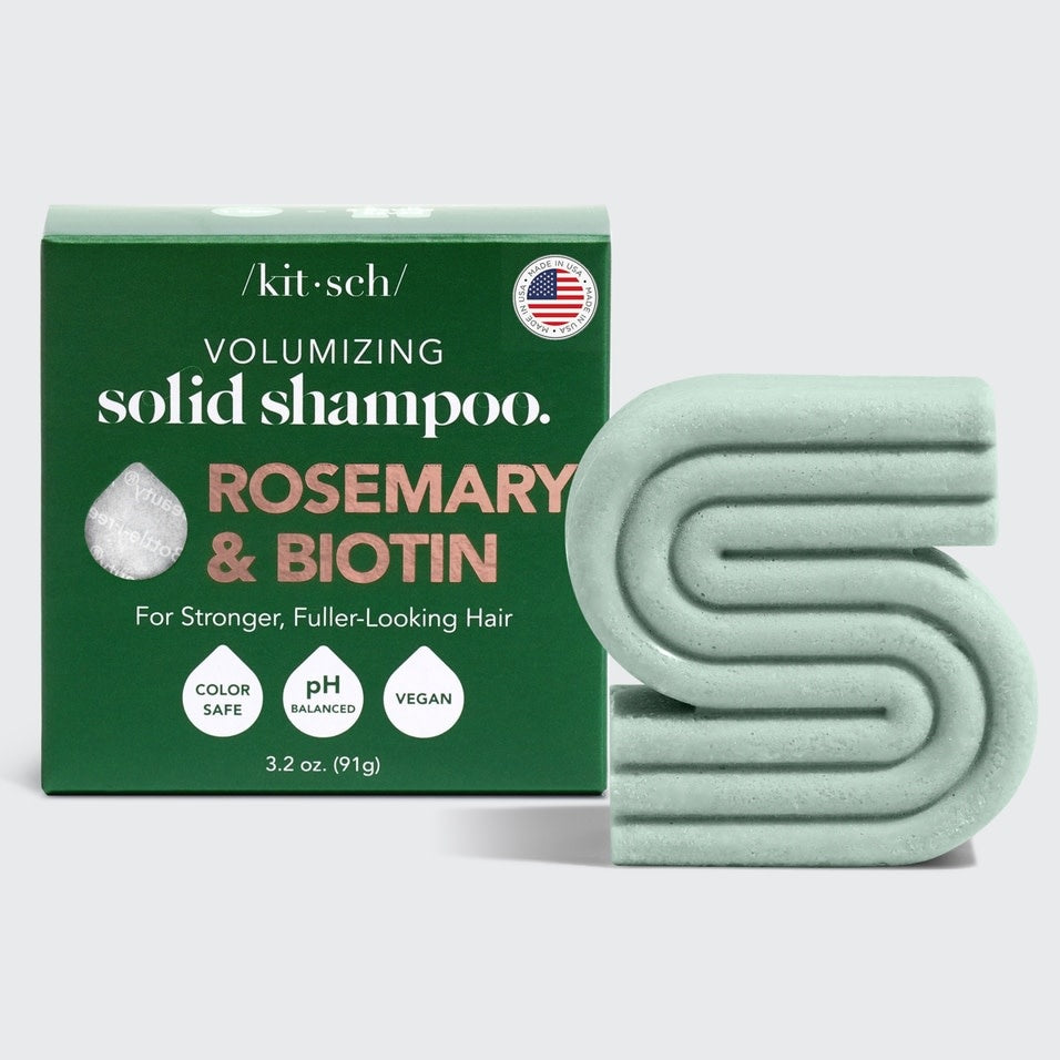 Rosemary & Biotin volumizing solid shampoo bar in a natural beige tone with visible botanical speckles.