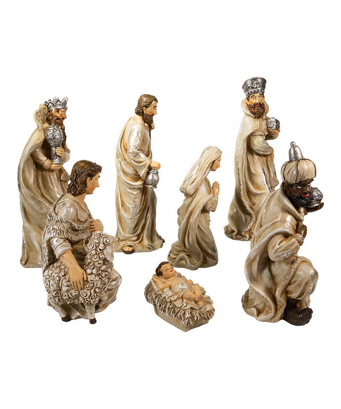 Seven-piece nativity table set featuring the Holy Family, Three Wise Men, and a shepherd.