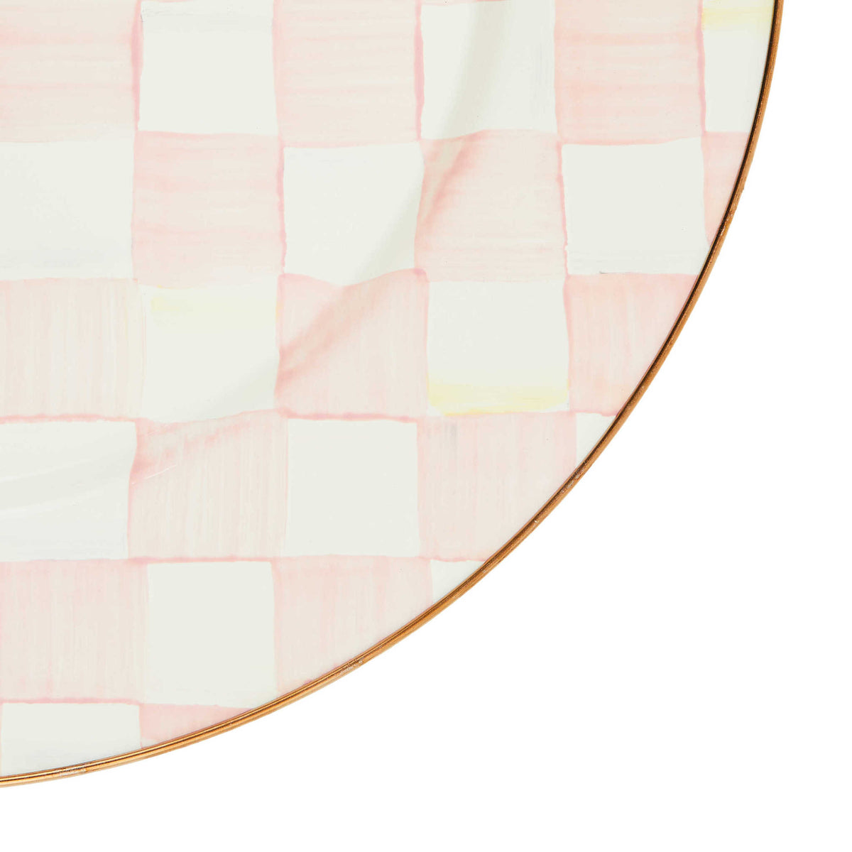 Rosy check enamel charger plate with hand-painted pink patterns on heavy-gauge steel and bronzed stainless rim.