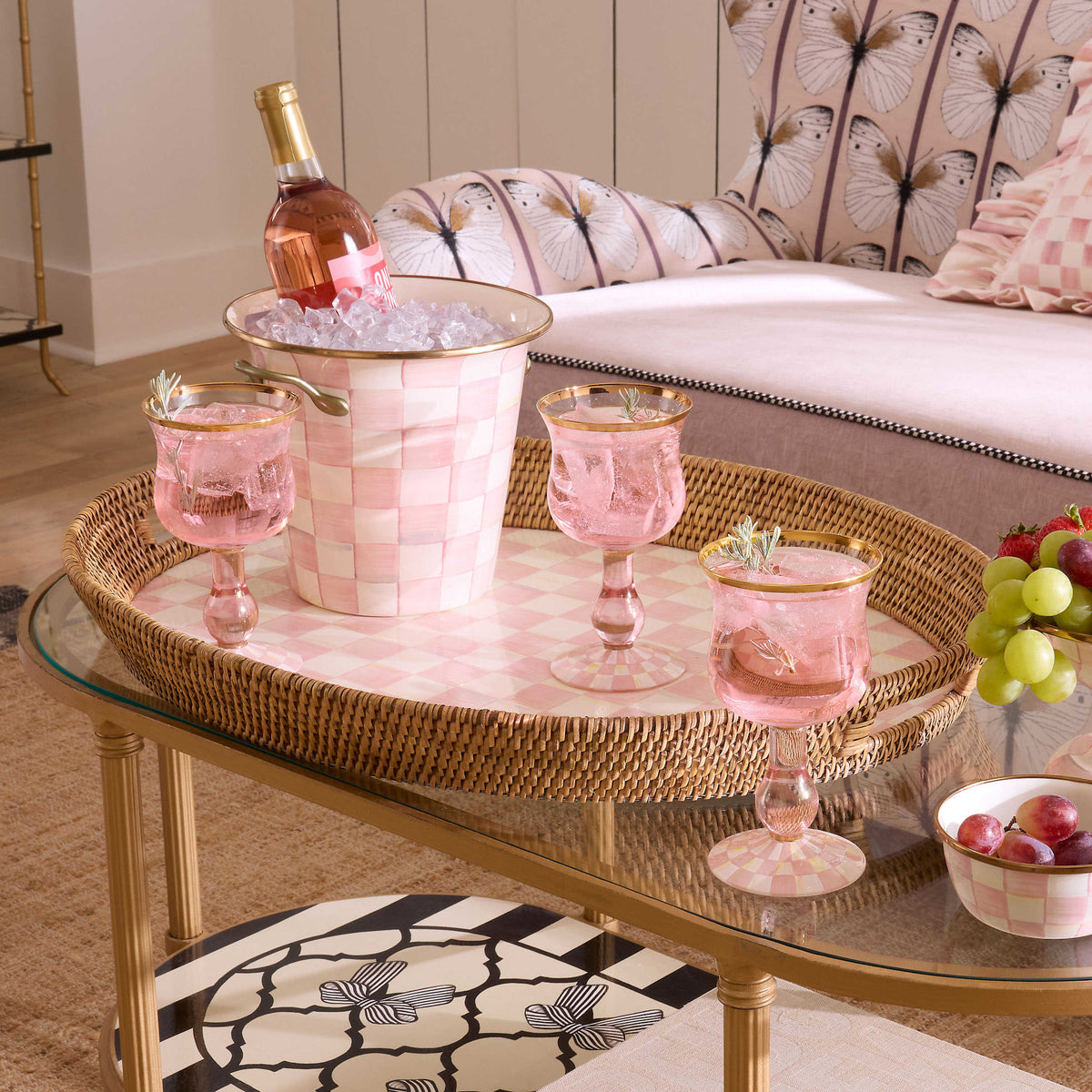 Rectangular party tray with hand-painted rosy check enamel base and woven rattan rim.